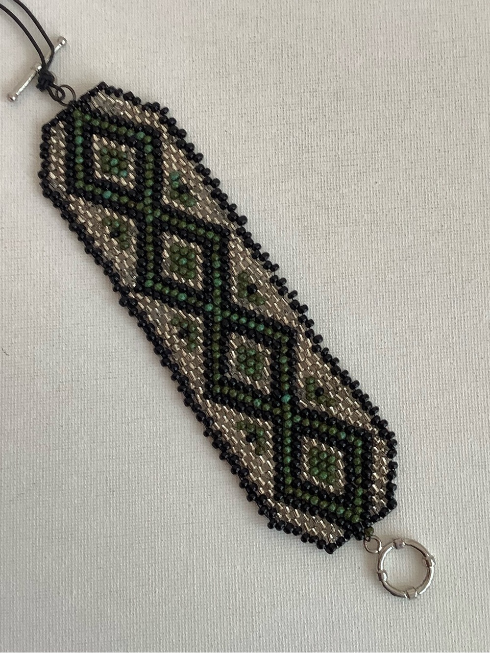 Green and Black Geometric Beaded Bracelet